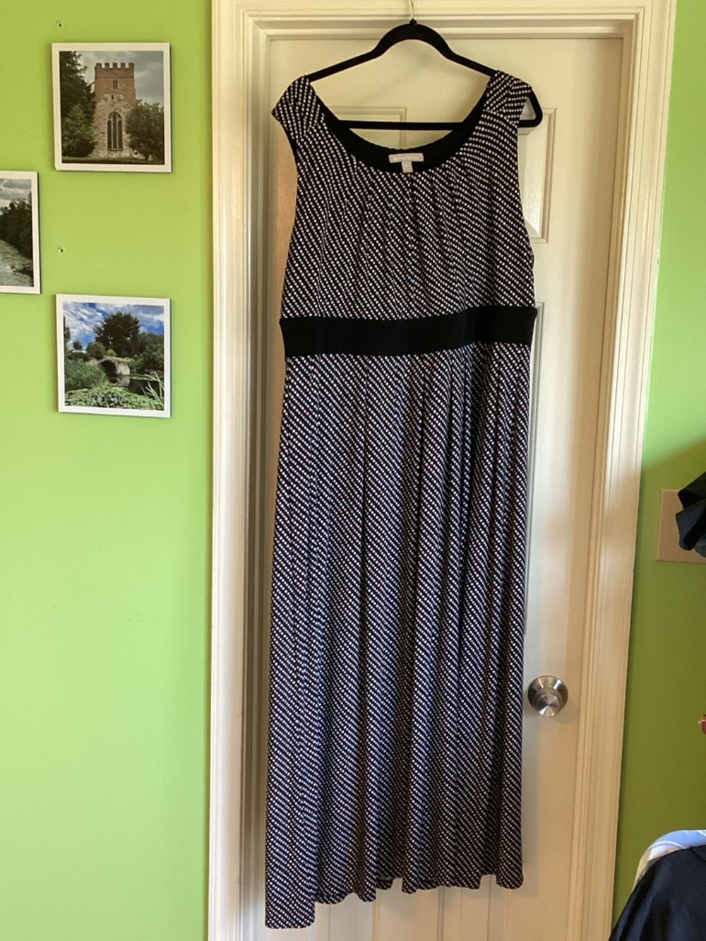 Empire waist black sleeveless maxi dress with pastel polka-dot pattern
